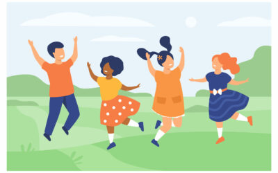 Diversity and childhood concept. Group of happy diverse kids playing together, jumping on grass, having fun, enjoying nature. Can be used for summer vacation or children outdoor party topics